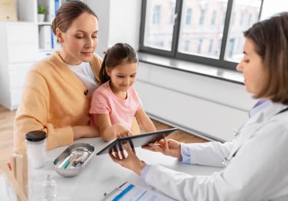 Choosing The Best Orthodontic Treatment For You Orthodontist Helping Parent